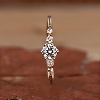 5 Stone Engagement Ring featuring dazzling diamonds.
