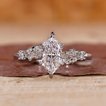 Dutch marquise ring muse ring side stone engagement ring
