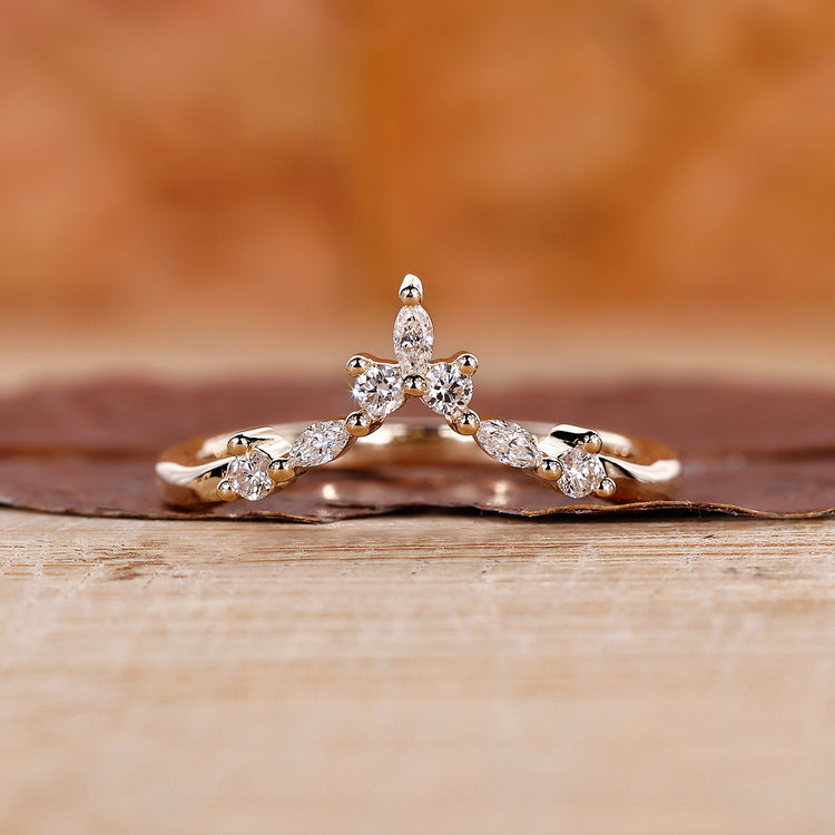 Marquise and Round Wedding Band featuring elegant diamonds.
