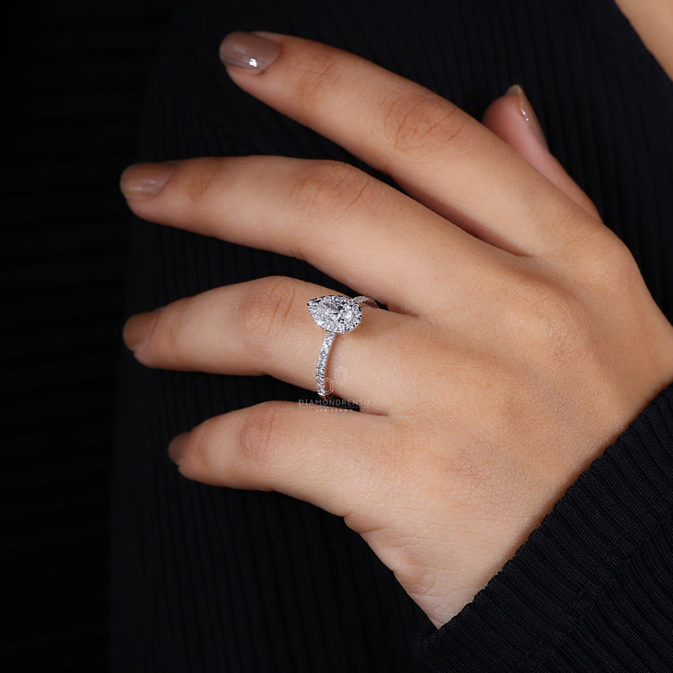 Pave diamond band highlighting a lab-grown diamond centrepiece.
