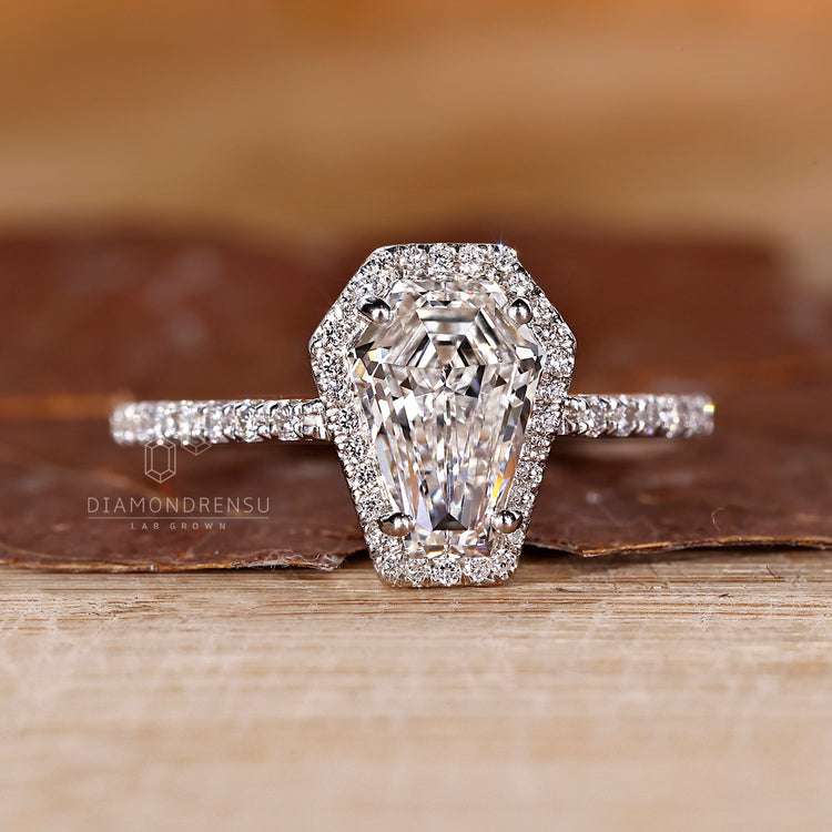 Coffin cut engagement ring in white gold diamond ring.
