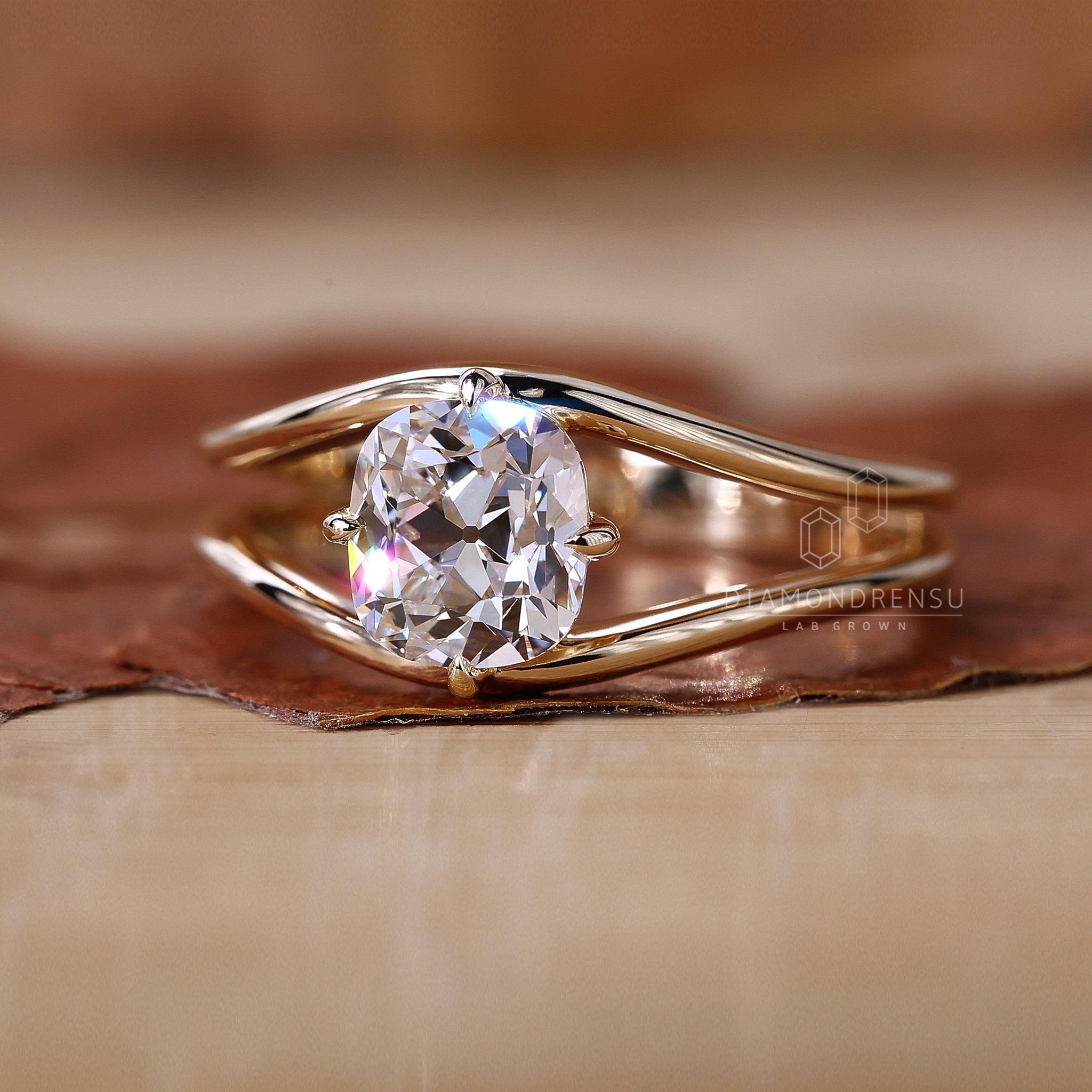  lab grown diamond set in a cushion cut solitaire ring, showcasing its brilliance.