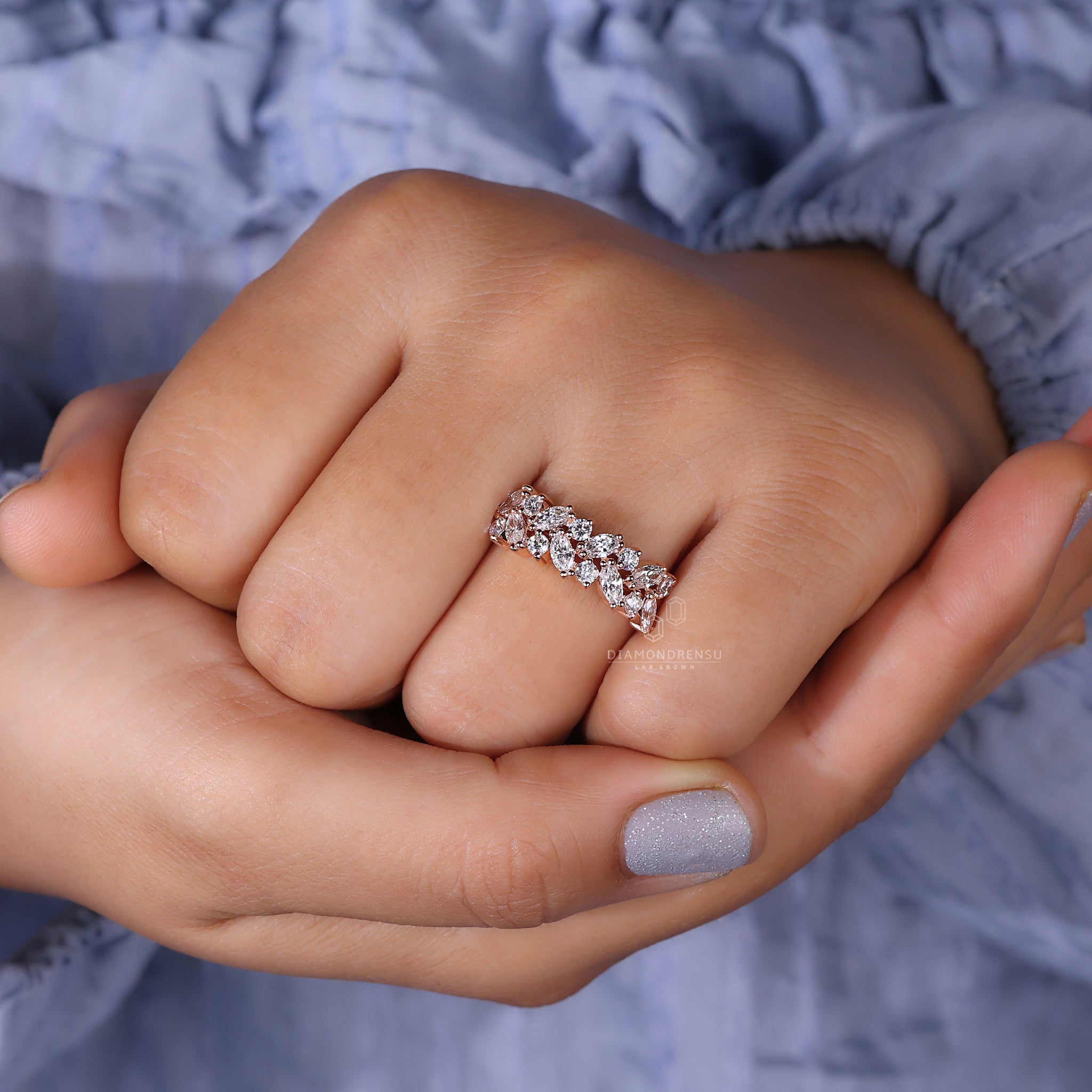 Marquise Half Eternity Band with a unique diamond setting.
