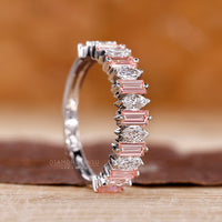 Custom Wedding Band featuring pink baguette and marquise stones.
