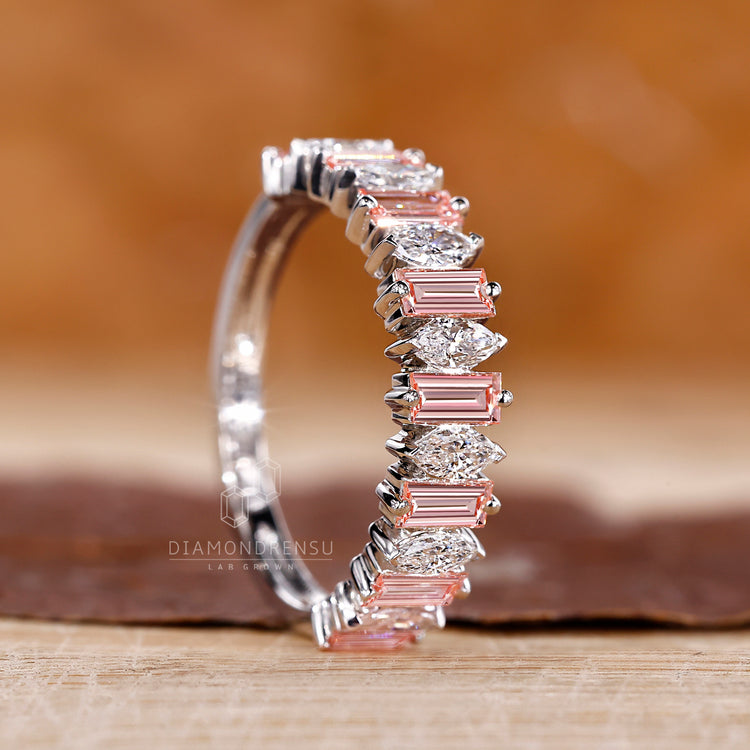 Custom Wedding Band featuring pink baguette and marquise stones.
