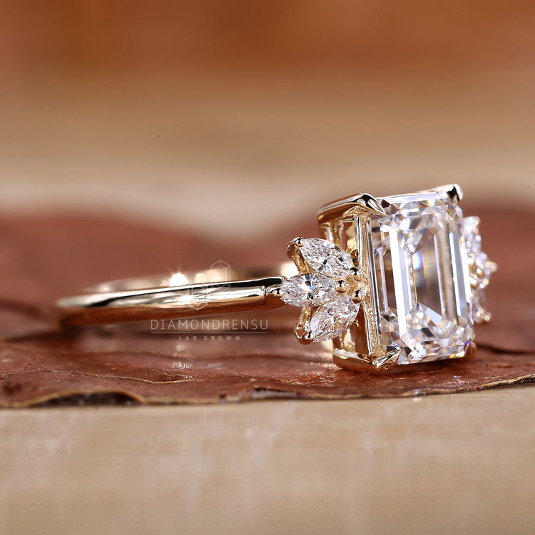 Six marquise side stones enhancing the charm of a Lab Grown Diamond ring.
