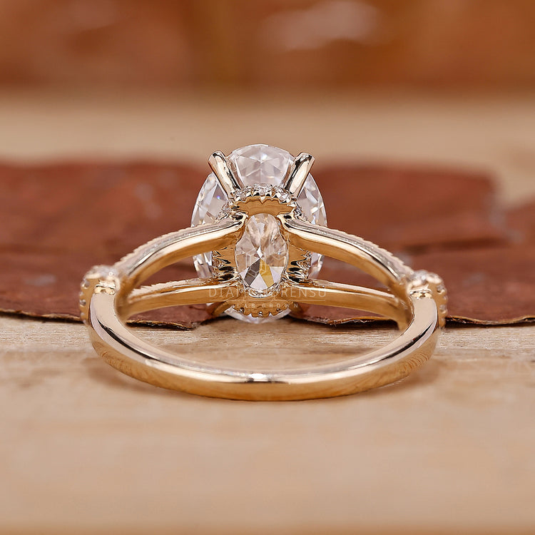 Pave Ring Setting with a dazzling oval diamond in yellow gold.
