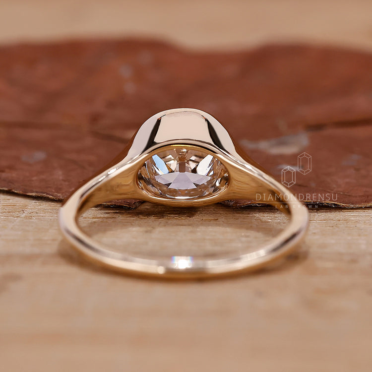 Bezel Set Engagement Ring with a secure and modern design.
