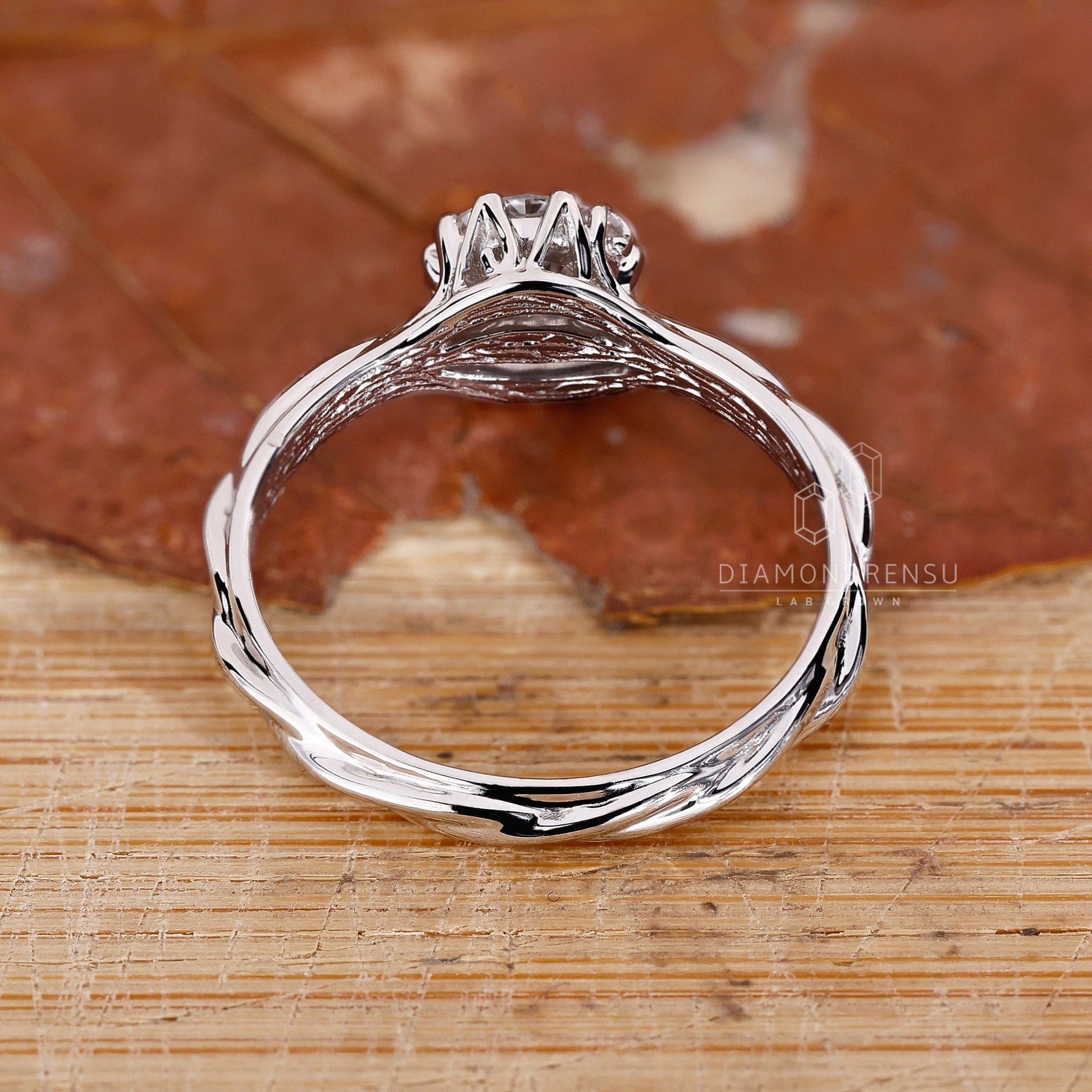 Nature inspired wedding ring showcasing a round solitaire diamond, symbolizing growth and eternal love