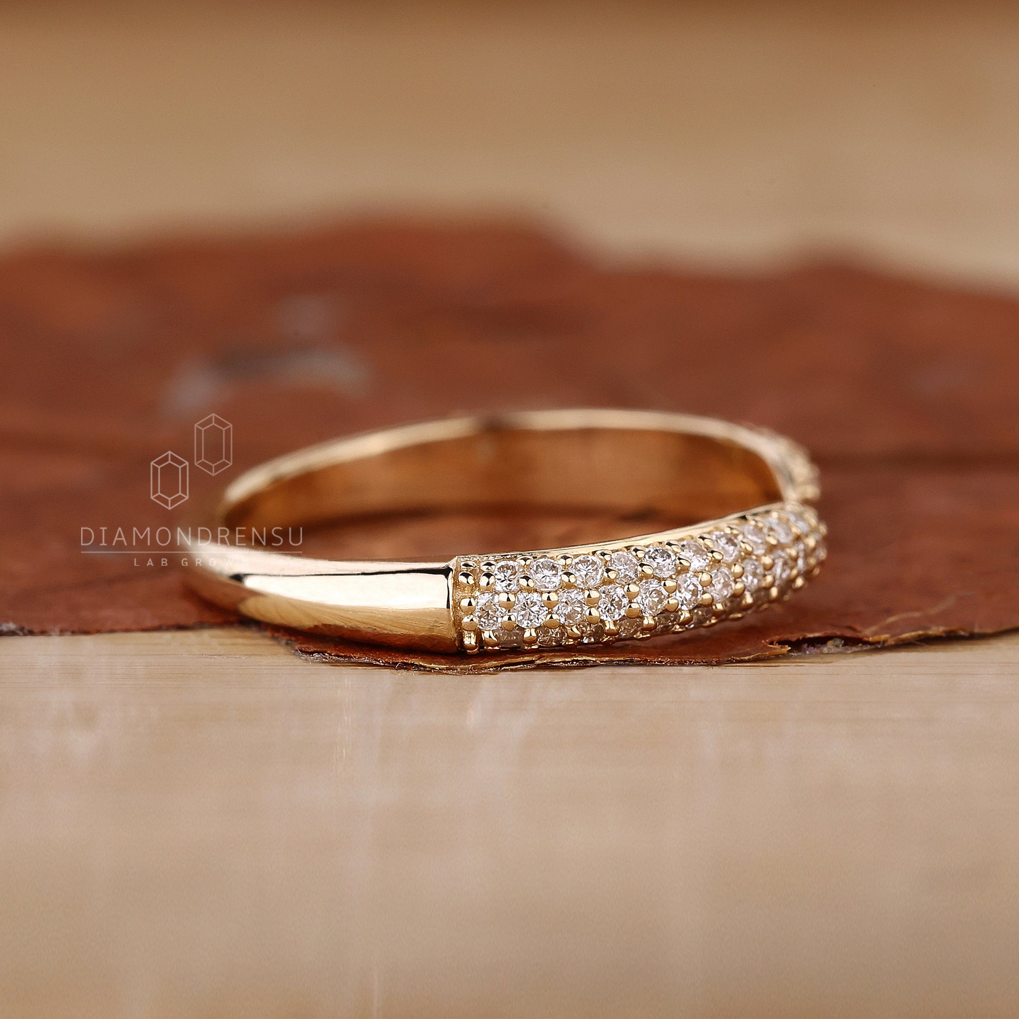 Three Row Pave Wedding Band with intricate diamond details.
