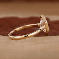 Bezel Engagement Ring with a secure and modern setting.
