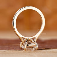 Yellow gold engagement ring with IGI certified diamond.