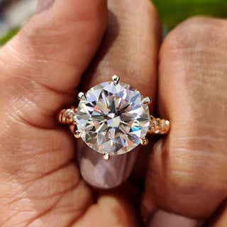 Round cut engagement ring set in a classic solitaire style.
