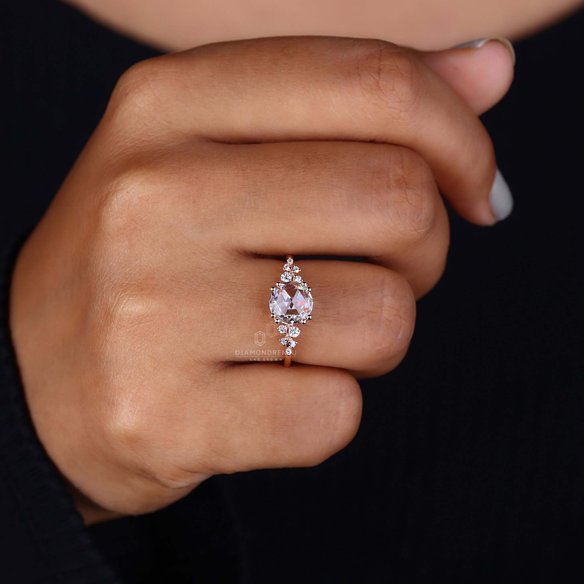 Gorgeous rose cut diamond engagement ring on a hand, capturing the moment of a dreamy proposal