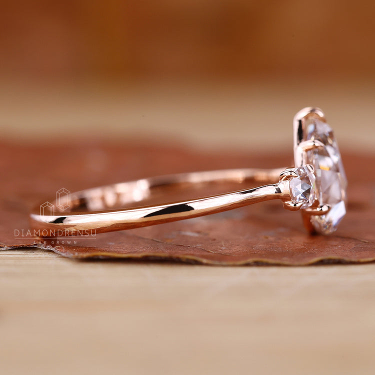 Pear Diamond Ring set in a handmade ring with timeless appeal.
