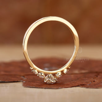 Gold Ring with brilliant diamond accents.
