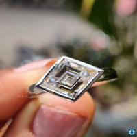 Elegant white gold engagement ring with moissanite.
