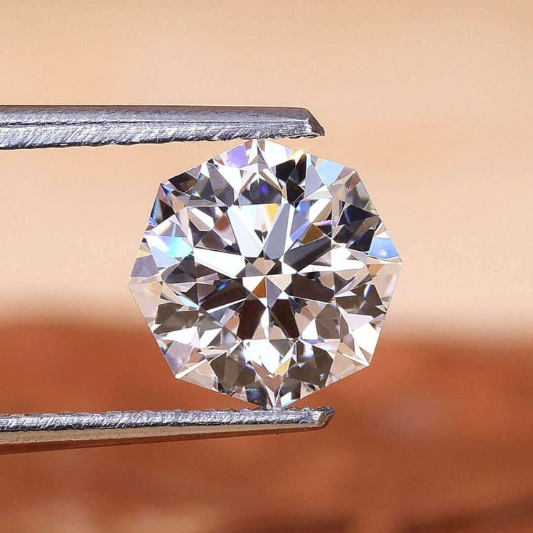 This 1.11 carat diamond features a classic octagon cut design.
