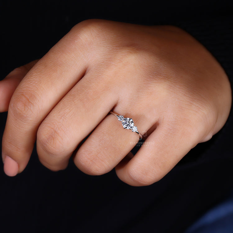 Three stone engagement ring in a classic setting.
