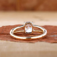 Pave diamond details accentuating the beauty of the elongated cushion cut