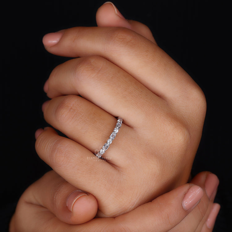 Emerald Cut Diamond set in a sleek and sophisticated wedding band.

