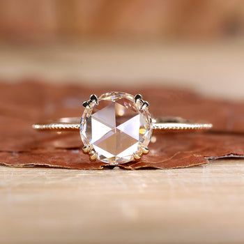 Solitaire Diamond Engagement Ring with a brilliant solitaire diamond.

