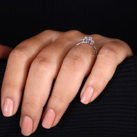 3 Stone Round Cut Diamond Ring for timeless elegance.
