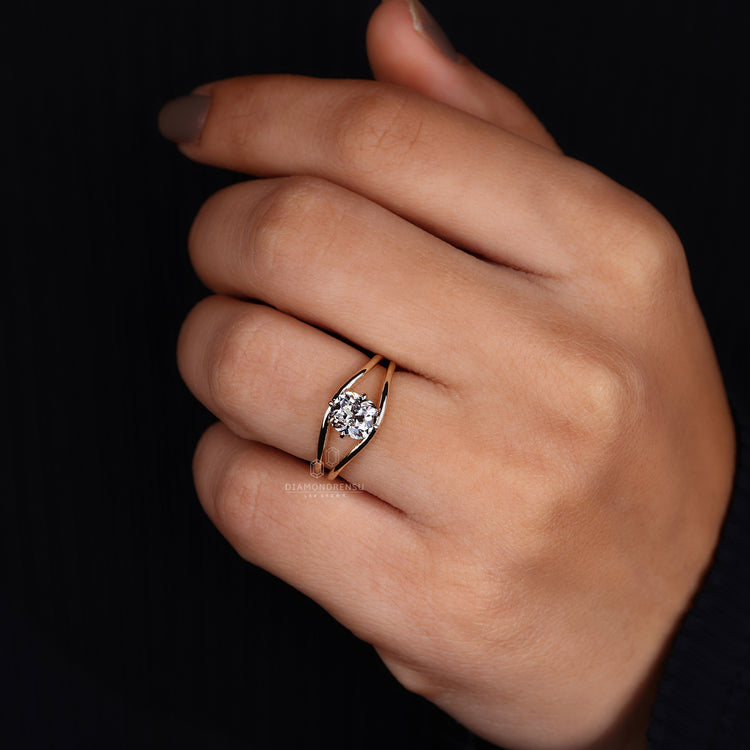 Unique eye-shaped diamond ring with a modern design.