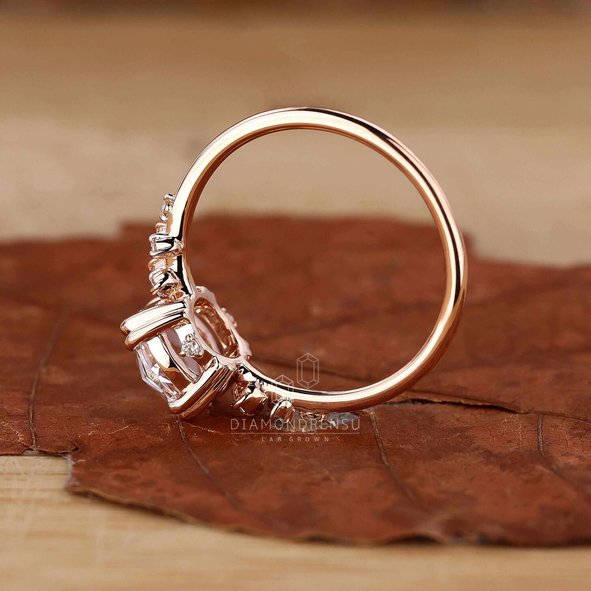Sophisticated vintage rose gold engagement ring set against a soft, romantic backdrop