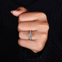 Round Diamond Engagement Ring set in a sleek white gold band.