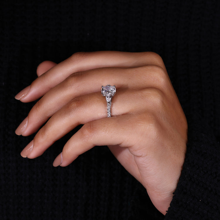 Pear Side Stone Ring with beautifully cut diamonds.