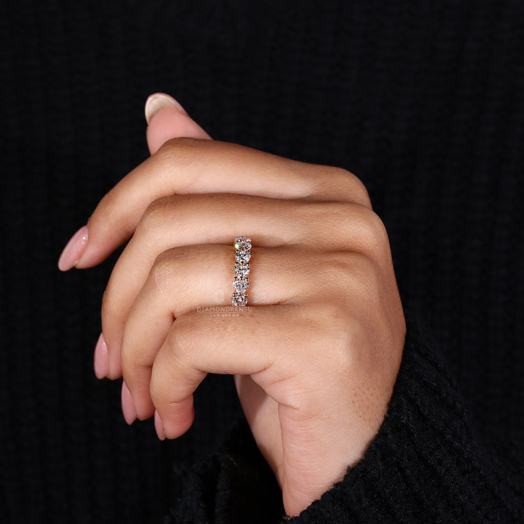 Sophisticated prong set wedding band designed to maximize diamond brilliance.
