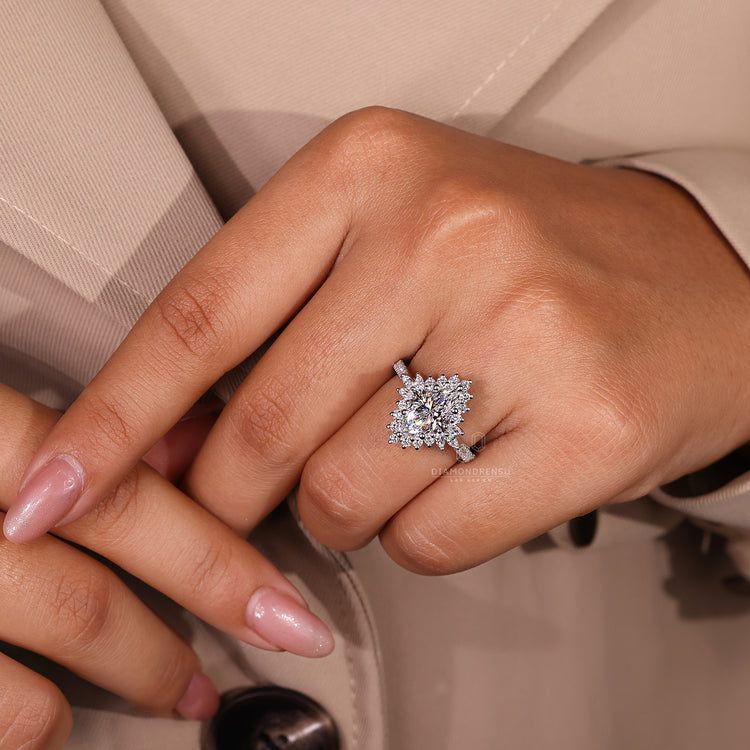 Sparkling pave ring with a centre marquise cut diamond.
