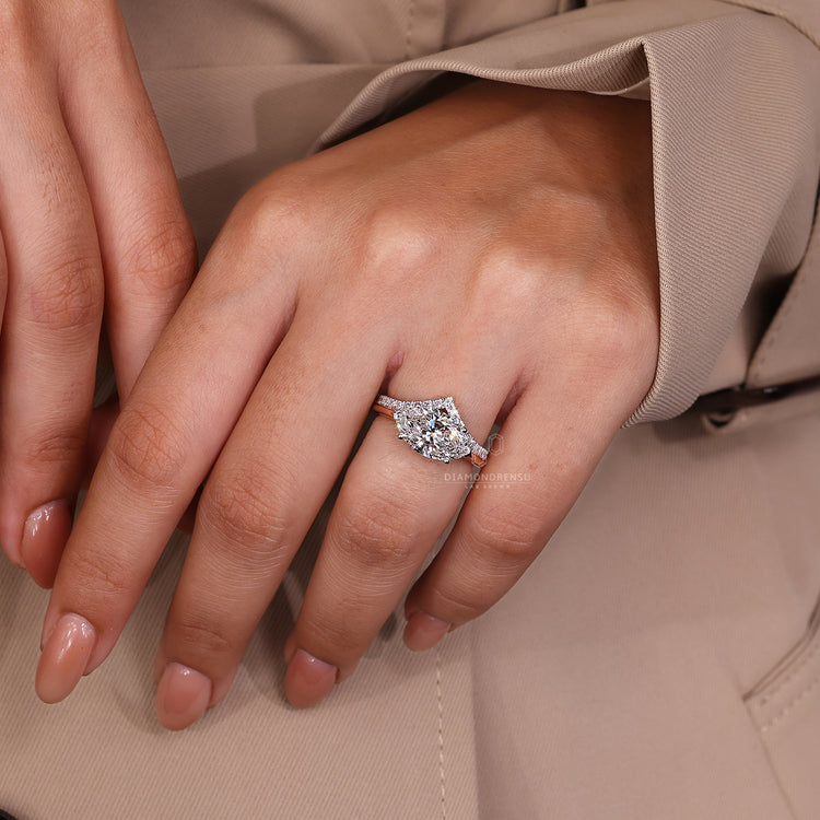 Hidden halo ring adding elegance and charm to your engagement ring.
