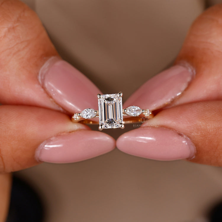 Classic emerald cut engagement ring in a luxurious handmade design.