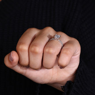 Handmade ring with princess cut stone for a unique look.
