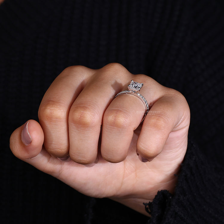 Handmade ring with princess cut stone for a unique look.
