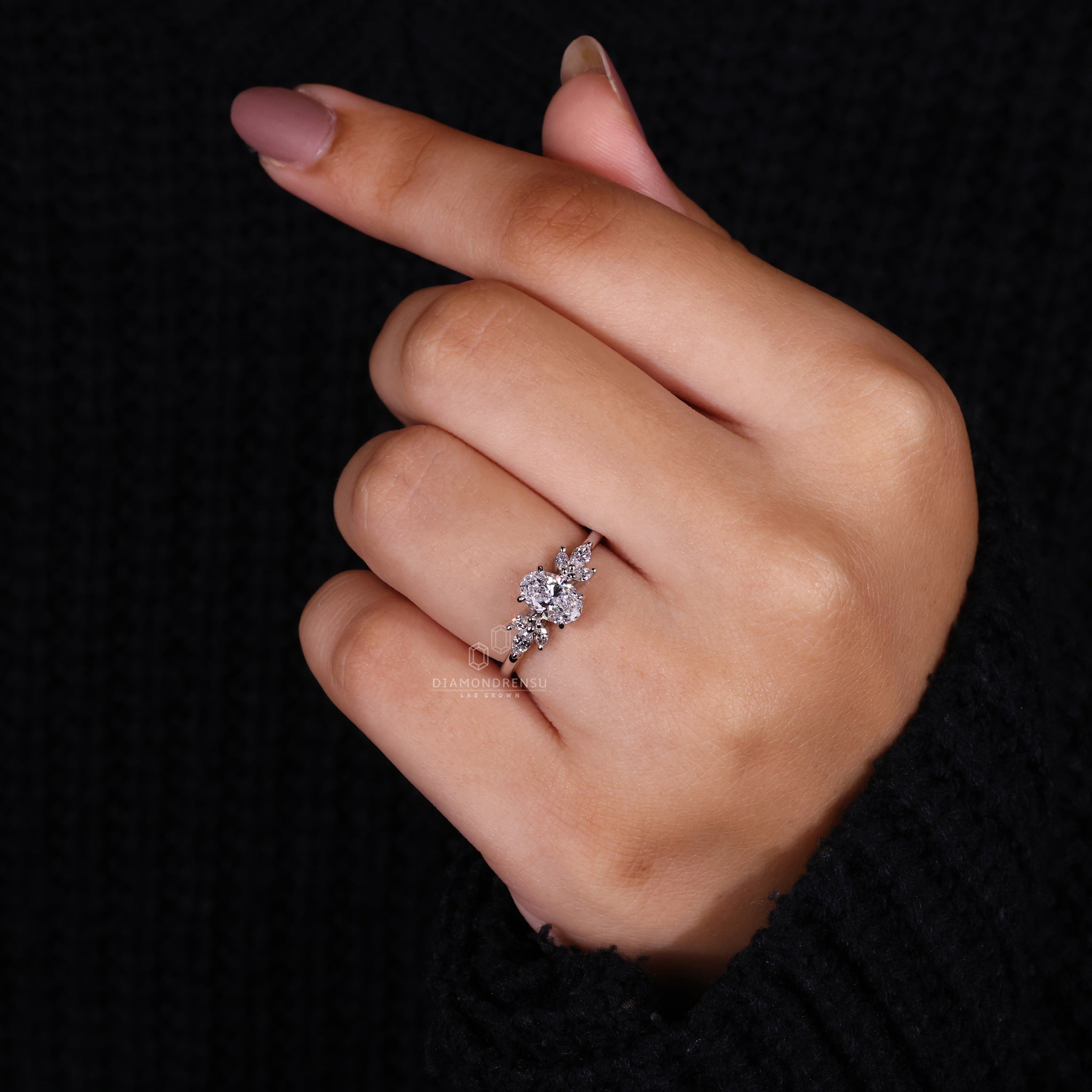 Model Wearing Lab-Grown Diamond Engagement Ring with Oval Center Stone