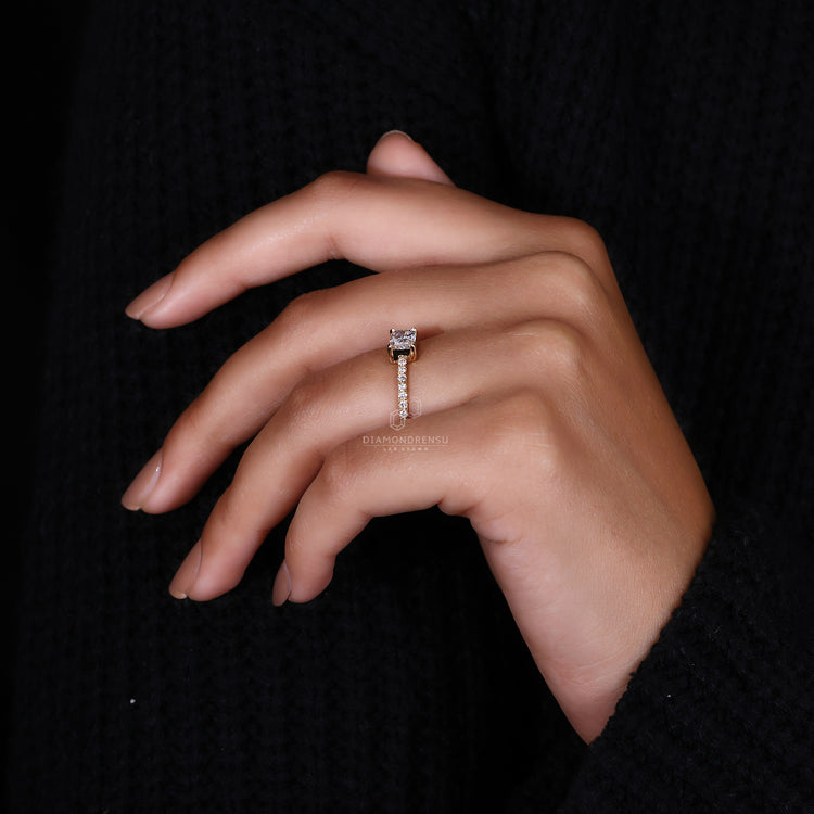 Radiant Cut Ring with brilliant diamond in pave setting.
