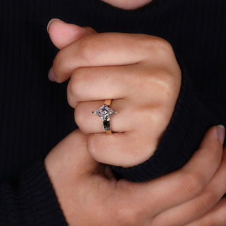 A captivating solitaire diamond engagement ring, distinguished by its exquisite lozenge cut diamond, embodying the essence of love and fidelity.