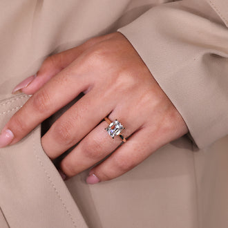 Handmade ring featuring diamond solitaire design.