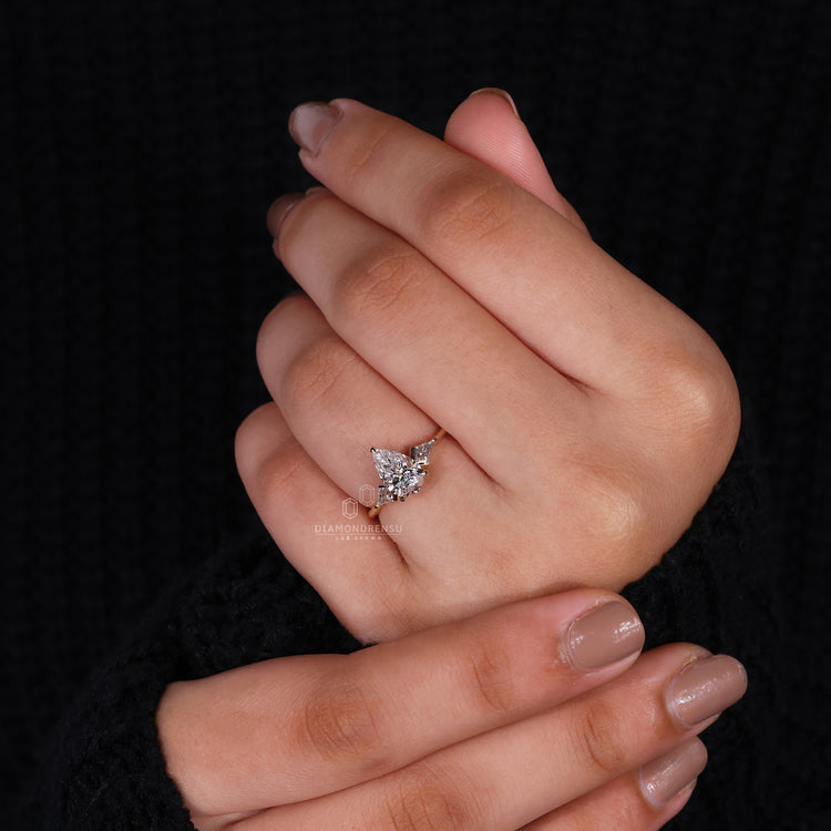 Three Stone Diamond Ring with pear-shaped diamonds.