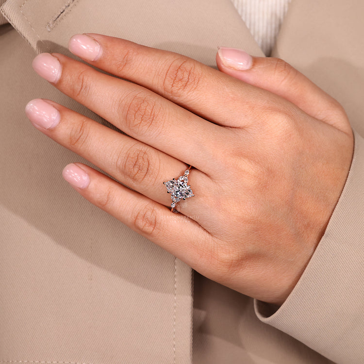 6 prong claw setting on marquise shaped diamond ring lab diamond.
