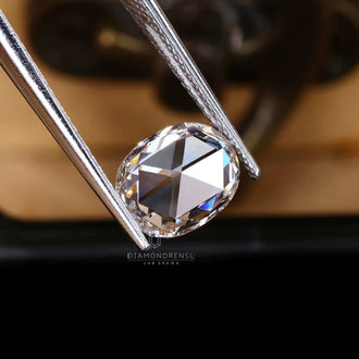 This 1.45 carat diamond has a rose cut elongated cushion antique style.
