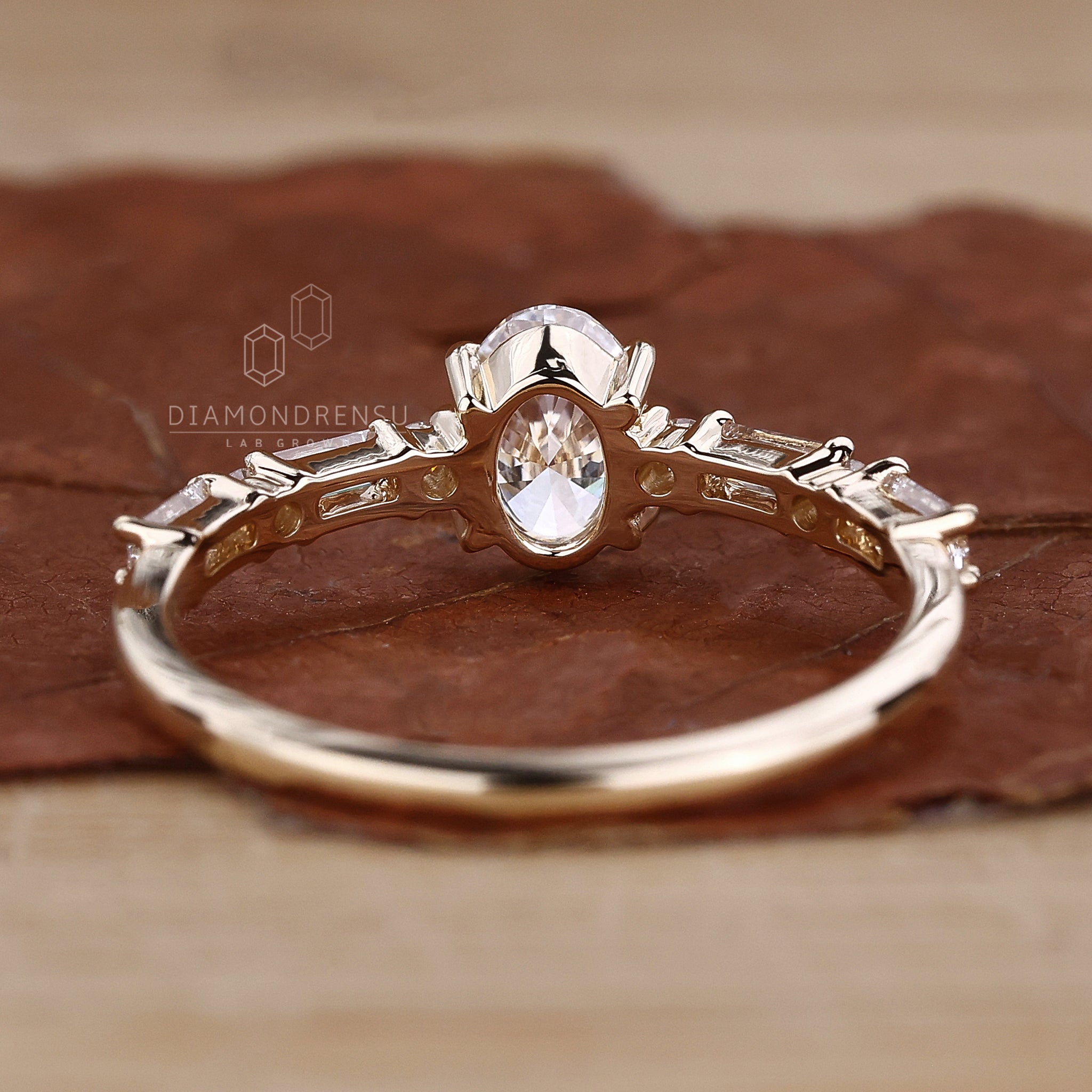 Handmade ring with Round Side Stone accents for a classic touch.
