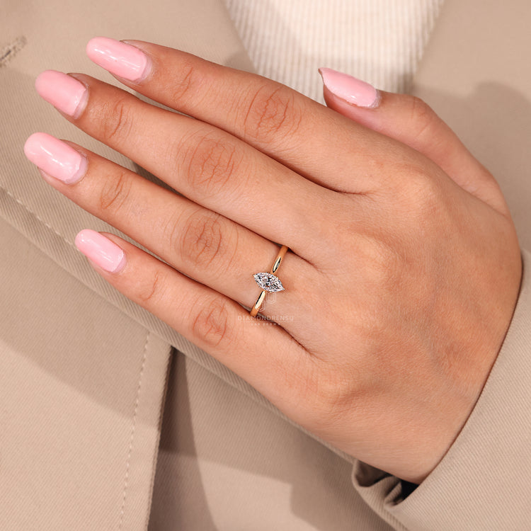 Diamondrensu engagement ring with custom tapered shank design.
