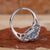 Beautiful 2 Carat Oval Diamond Ring glistening under soft light