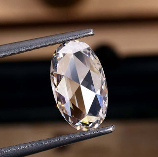 Oval rose cut diamond with 1 carat weight.