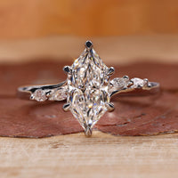 Dutch Marquise Ring with stunning diamond accents.