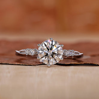 A stunning white gold engagement ring with a sleek and elegant design.
